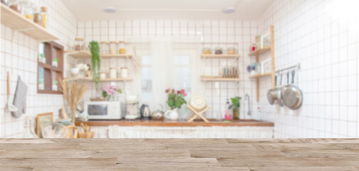 Wood table top on blur kitchen room background .For montage product display or design key visual layout