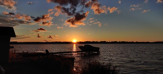 Fototapeta na wymiar sunset with boat dock