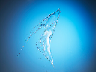 Water splash on blue background