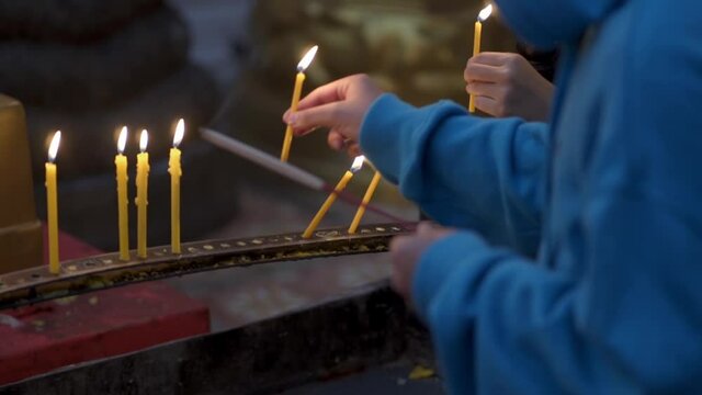 Close up of lighting candles at Wat Phra That Doi Suthep temple, Chiang Mai