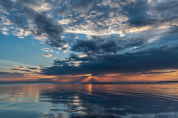 Sunset on the lake in summer, Pskov region