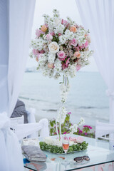 Latino Bride and groom with white tuxedo 