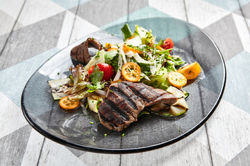 Salad with veal and kumquat