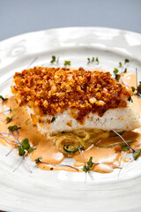 Baked cod fillet with sauce