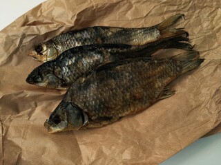 dry fish on a paper bag