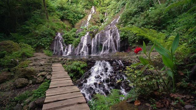 Pucak Manik Waterfall is one of the most beautiful waterfalls in Bali located in Singaraja. Bali, Indonesia. 4K