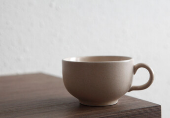 coffee cup on wooden table
