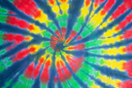 reggae abstract spiral tie dye. red yellow green tricolor pattern.