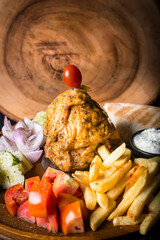 Chicken Gyros kebab served with bread,french fries and salad