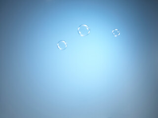 Soap bubbles on blue background