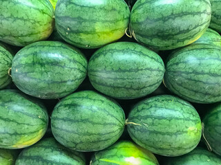 Arranging watermelons into piles