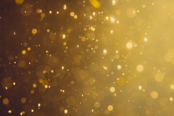 Fototapeta premium Dark Abstract Gold bokeh sparkle on black