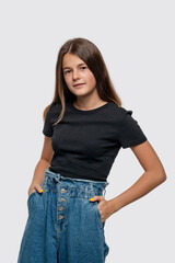Obraz premium Studio shot of young smiling teenager girl, isolated