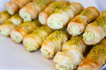Stuffed canapes of homemade production lying on top of each other.