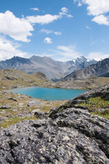 Fototapeta na wymiar The Valley of the Seven Lakes with a small glacial lake surrounded by Altai mountains, Russian Federation, the Altai Republic