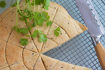 Himbasha (Ethiopian Flatbread) on a grill.