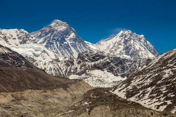 Snow-capped mountains Everest and Lhotse in the Himalayas. View from the west. Clear blue sky, a...