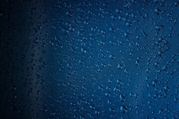 Rain texture drops on blue background