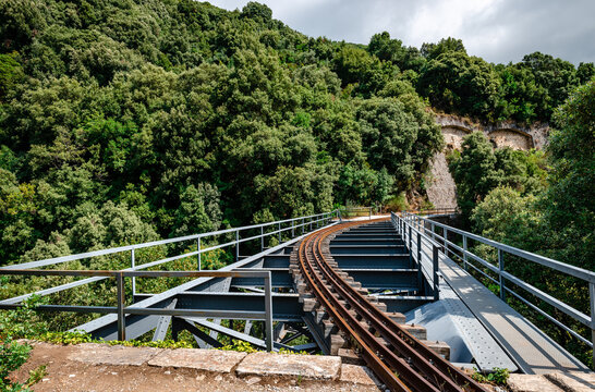 The old historic steel bridge of Taxiarchis, aka De Chirico&rsquo;s Bridge, near Milies station, in Mount Pelion, Thessaly, Greece.