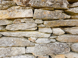 A texture of a irregular stone wall