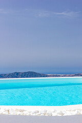 Fototapeta na wymiar Luxurious swimming pool in Santorini Greece