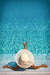 woman in luxury spa resort near the swimming pool. - 376613132