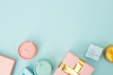 gift boxes on blue pastel background, copy space, Flatlay