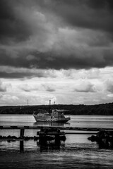 Ship on the river, storm