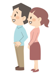 空を見上げる若い夫婦