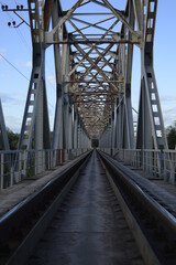 Railway bridge, railway tracks, metal structure.