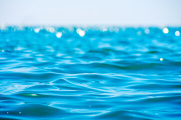 Lights on sea background. Waves.