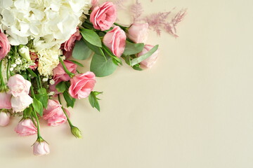 bouquet of delicate roses, eustoma, hydrangea on light background.Flowers composition.Mother's Day, Valentine's Day,birthday. Copy space. I love you concept.Wedding invitation.