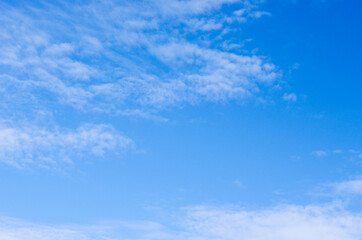 Naklejka premium White clouds in blue sky