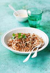 Keto paleo daikon spaghetti with bolognese sauce, selective focus