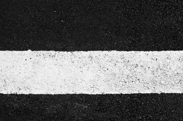 asphalt texture with a white line painted