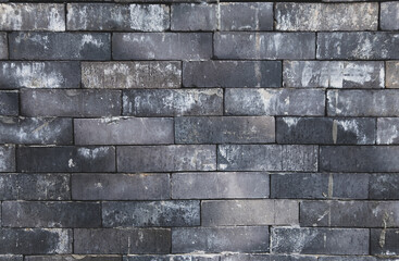 Old worn brick wall texture background.