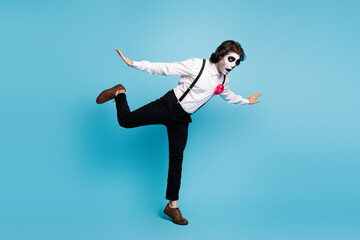 Full length body size view of his he handsome funky comic creepy gentleman having fun jumping falling down zombie theme isolated bright vivid shine vibrant blue color background