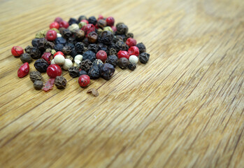 Mix of color pappers on wooden board with blur effect.