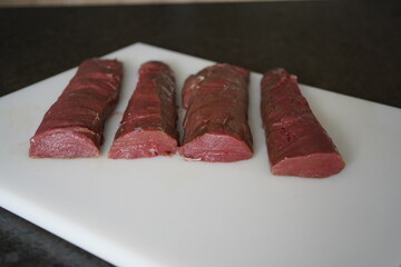 fresh raw fillets from the red deer calf