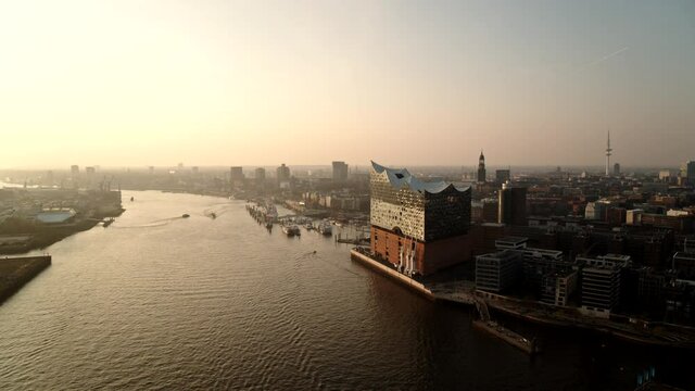 Elbe Philharmonic Hall on Elbe River at sunset, Hamburg, Germany