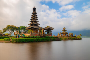Pura Ulun Danu Bratan temple. Balinese landmark. Water reflection. Slow shutter speed. Bratan lake, Bali, Indonesia