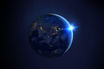 Earth at the night. Sunrise over planet Earth, view from space. City lights on planet....