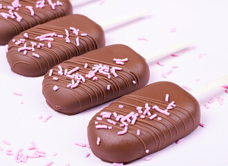 Ice cream in chocolate on a stick