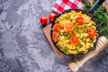 delicious pasta and cheese casserole in a cast iron skillet