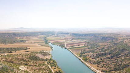 Aerial view of th agriculture fields and lake.
