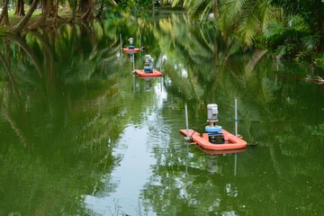 Saving Environment - Water turbine treatment machines in a Canal. 
