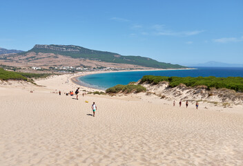 Fototapeta na wymiar Landscape beachscape from dunes of playa de bolonia, august 2020