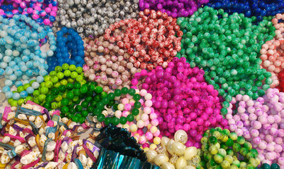 Beautiful jewelry on the background of seashells. beads made of pearls in shop. gift concept abstract photo