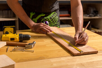 Carpenter working with equipment.Concept you can maker.