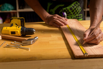 Carpenter working with equipment.Concept you can maker.